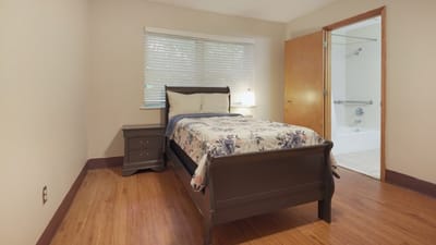 Cozy private room with a single bed and window