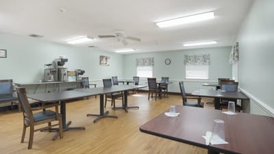 Bright dining room with tables and chairs