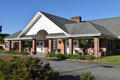 Exterior view of Caremoor Retirement Center entrance
