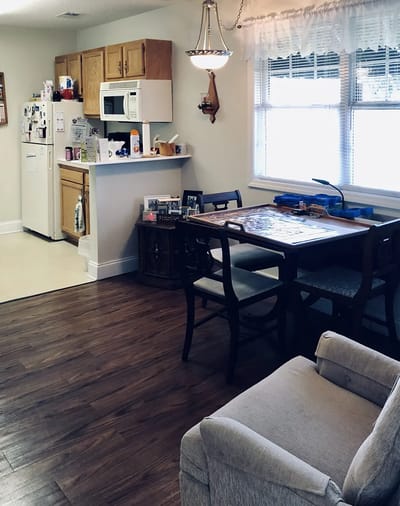 Cozy activity area with a kitchen and dining table