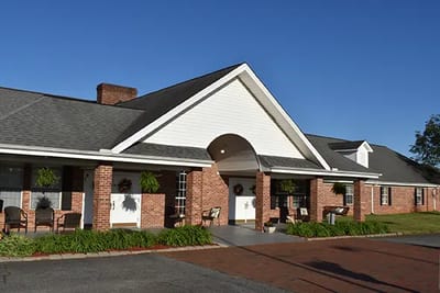 Exterior view of Caremoor Retirement Center entrance