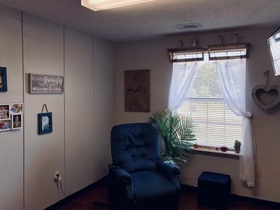 Cozy interior space with a recliner and window