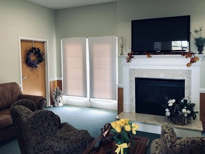 Cozy interior lounge area with a fireplace