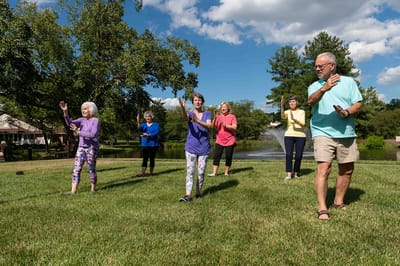 Residents participating in an outdoor exercise class