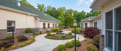 Beautiful landscaped courtyard with pathways and gardens