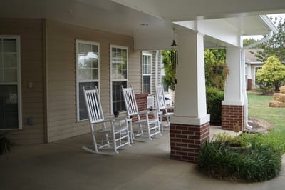 Outdoor rocking chairs on a covered porch