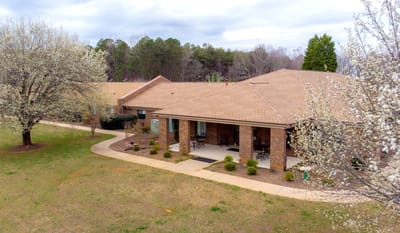 Aerial view of Country Time Inn with landscaping
