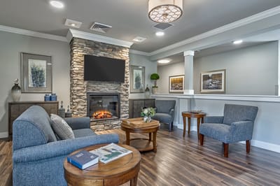 Cozy common area with seating and fireplace
