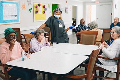 Residents enjoying an activity in a common area.