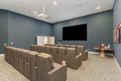 Interior of a cinema room with reclining seats