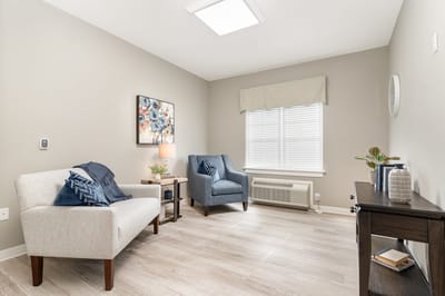 Bright and inviting interior room with seating