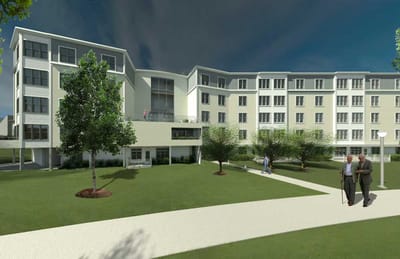 Exterior view of Haywood House with residents walking on the path
