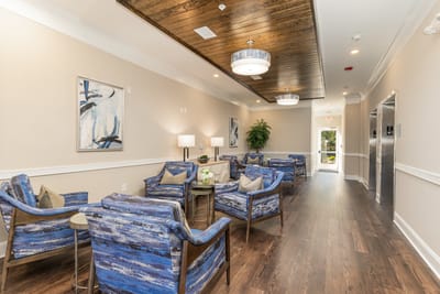 Common area lounge with seating and artwork