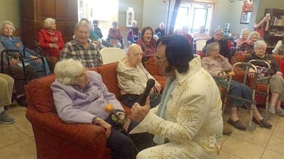Residents enjoying a live performance in a common area