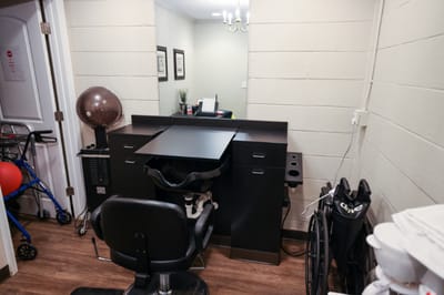 Salon area with styling chair and equipment