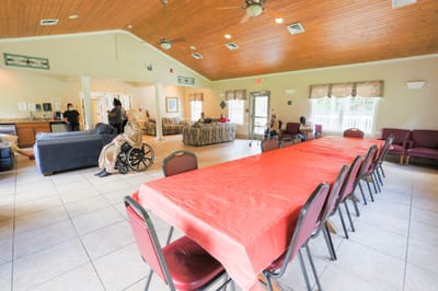 Interior common area with residents and staff