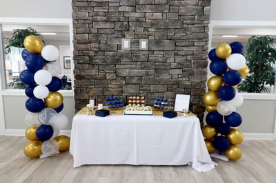 Decorated table with cake and balloons for a celebration