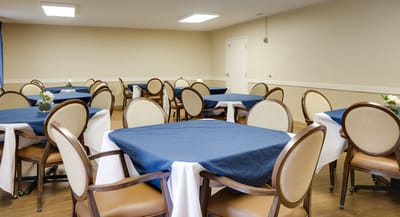 Interior dining area with tables and chairs