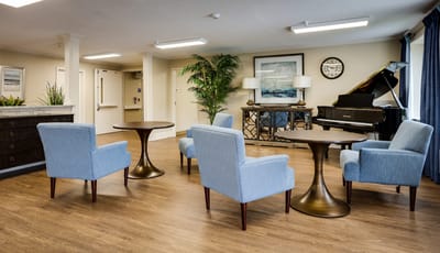 Cozy common area with seating and piano