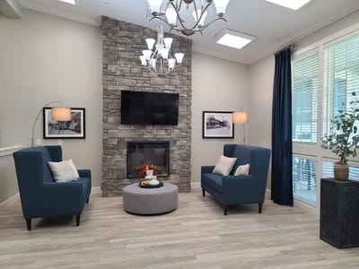 Cozy common area with comfortable seating and fireplace