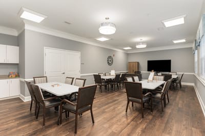 Bright common area with tables and chairs