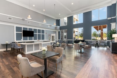 Bright and spacious common area with seating and natural light