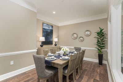 Elegant dining room setup with a large table and decor