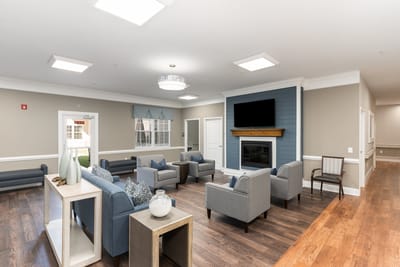 Interior common area with seating and fireplace