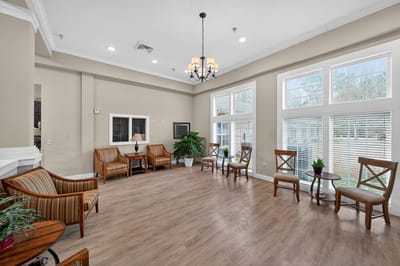 Bright common area with seating and windows