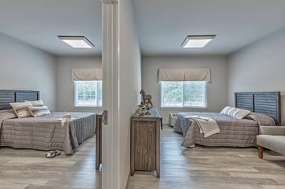 Interior view of a shared resident room with two beds