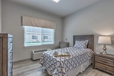 Cozy bedroom setup in a senior living facility