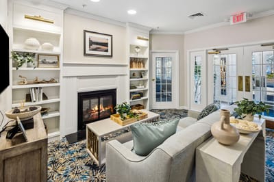 Cozy common area with a fireplace and seating