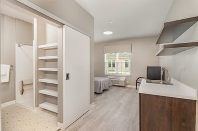 Interior view of a well-furnished resident room