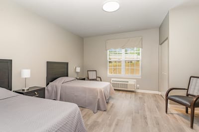 Interior view of a shared resident room with two beds