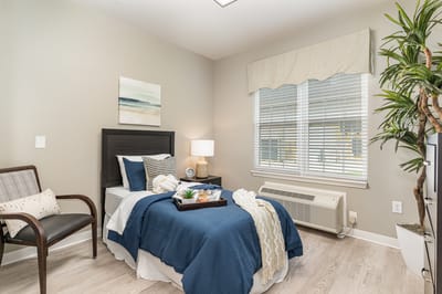 Cozy private resident room with blue decor