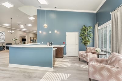 Bright interior common area with seating and decor