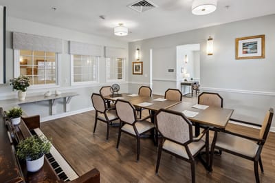 Interior view of a common area with dining tables