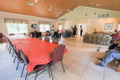 Residents and staff interacting in a common area