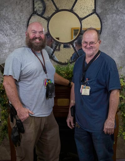 Staff members posing in a common area
