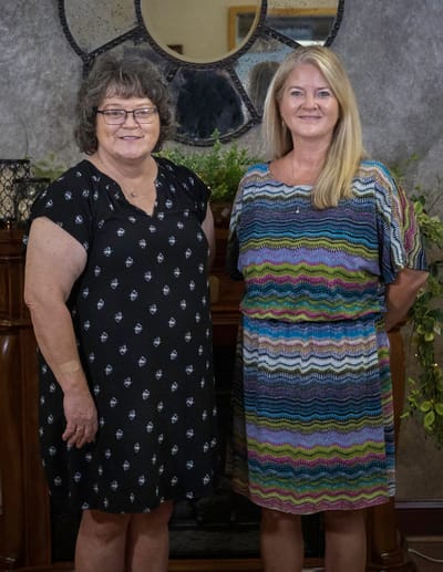 Staff member with resident in a welcoming common area