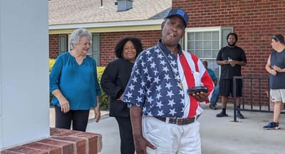 Residents enjoying time outside a nursing home