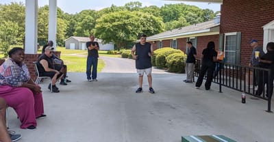 Residents enjoying an outdoor gathering with activities