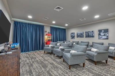A well-furnished common area with seating and decor