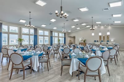 Elegant dining room setup in a senior living facility