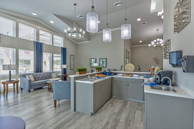 Bright common area with seating and refreshments