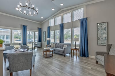 Bright common area with seating and natural light