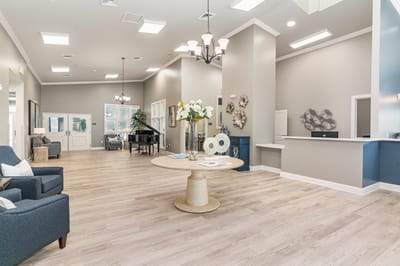 Bright lobby area with seating and décor
