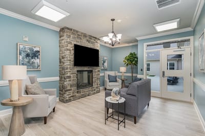 Comfortable common area with seating and fireplace