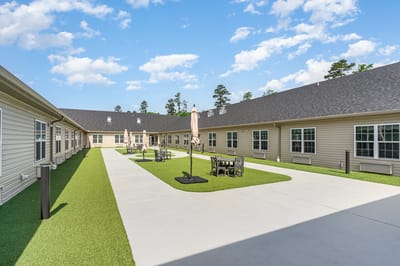 Courtyard with seating and green lawn