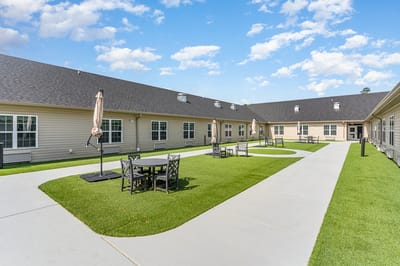 Outdoor courtyard with seating areas and pathways